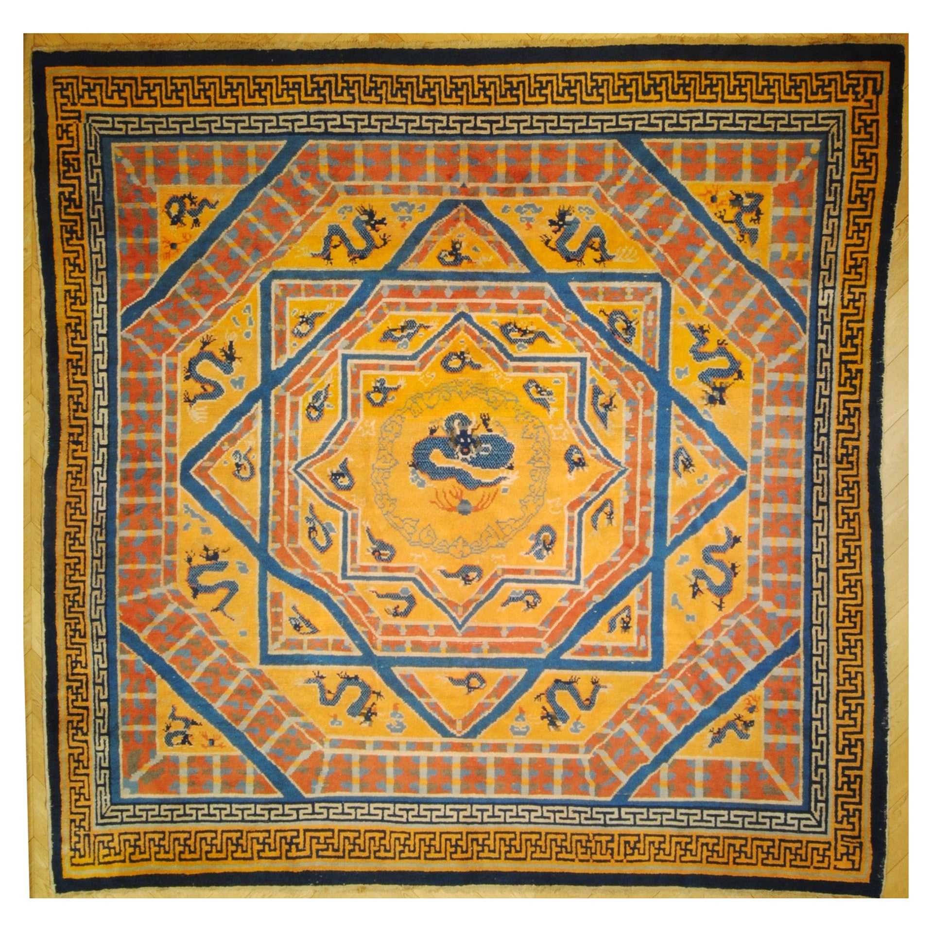 China orange background 8 dragons repeated in multiple levels and 8-pointed star in center For Sale