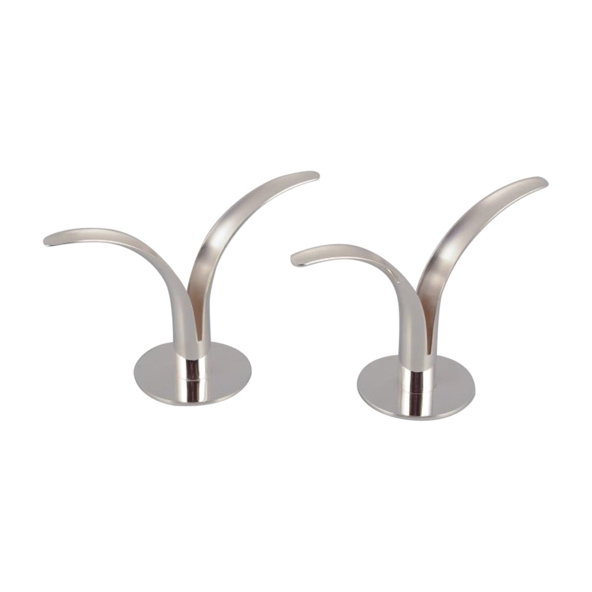  Skultuna, a pair of "Liljan" (Lilly) candle holders in plated silver.  For Sale