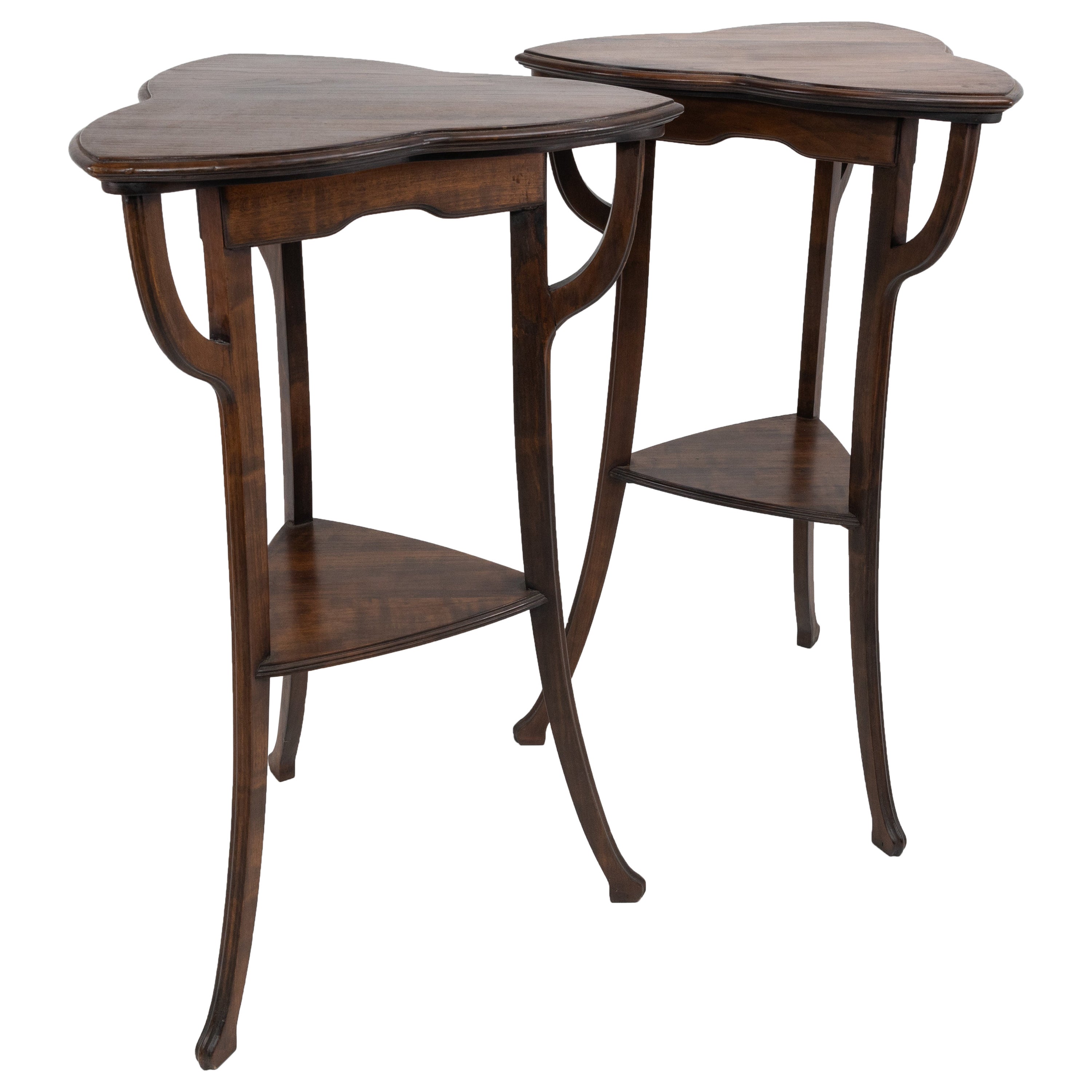 A pair of Art Nouveau beech stained side tables with clover leaf style tops For Sale
