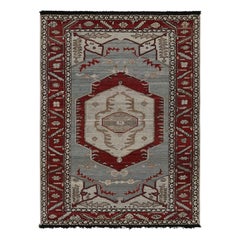 Tapis de style tribal rouge et bleu avec médaillon de Rug & Kilim