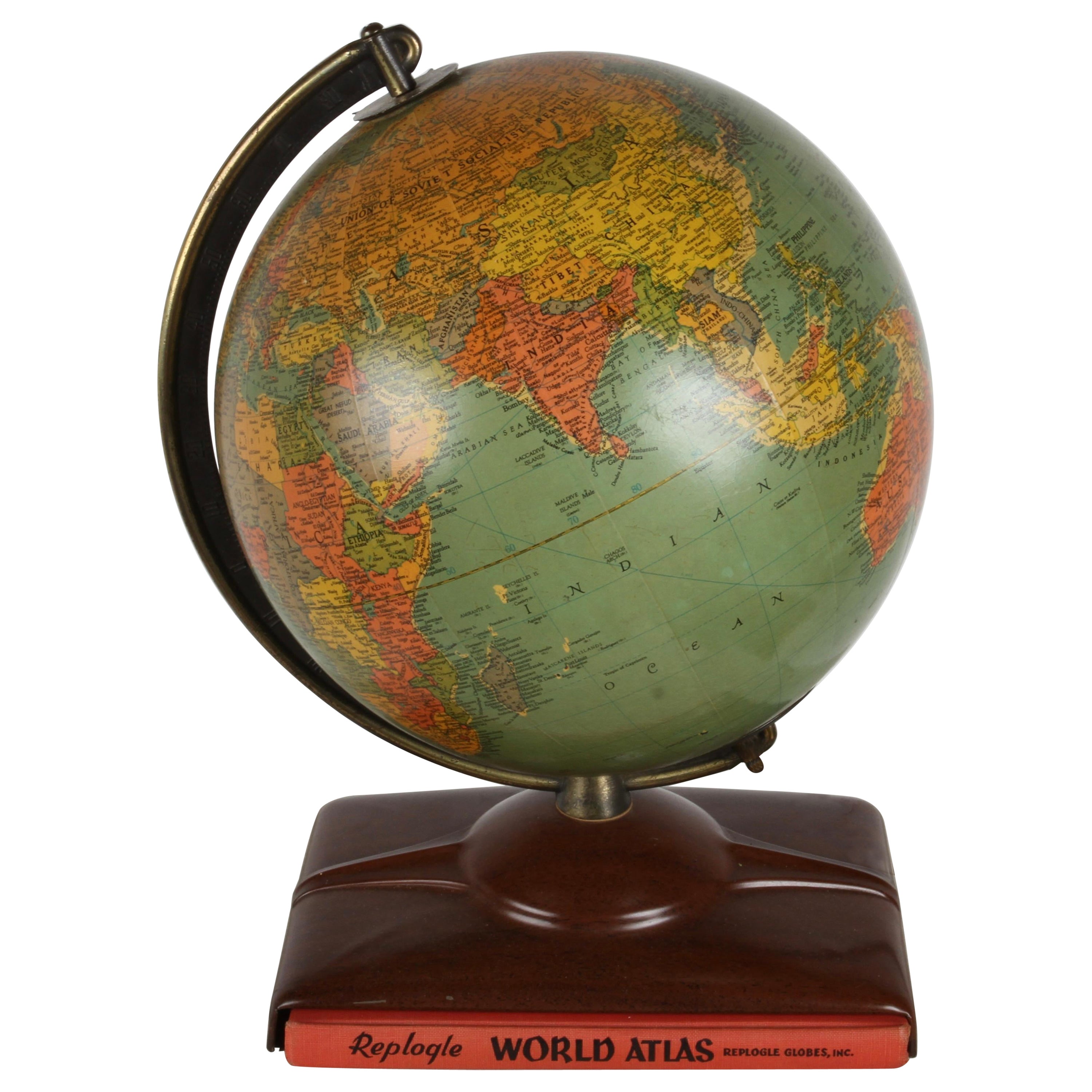 1950s Replogle Mid-Century Modern Illuminated 10" Glass Globe with Atlas  For Sale