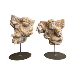 Set of two 1920s Baroque Style Sicilian Mixture Stone Sculptures of Angels