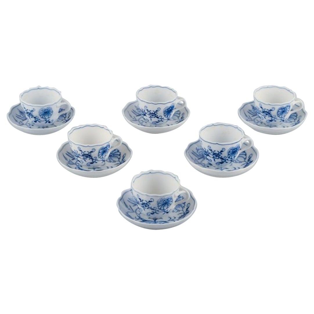 Meissen, Germany, six pairs of Blue Onion pattern coffee cups with saucers