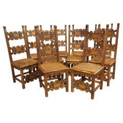 Ensemble de 10 chaises de salle à manger italiennes anciennes en noyer sculpté et cannage, vers 1880