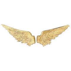 Paire d'ailes vintage en bois sculpté et doré