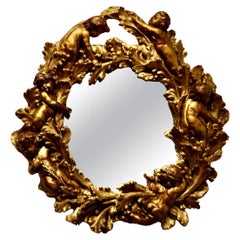 Antique A Superb 19th Century Italian Gilt Wreath Mirror  This is a charming piece 