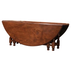 Antique Midcentury English Carved Chestnut Eight Gate-Leg Drop-Leaf Oval Table