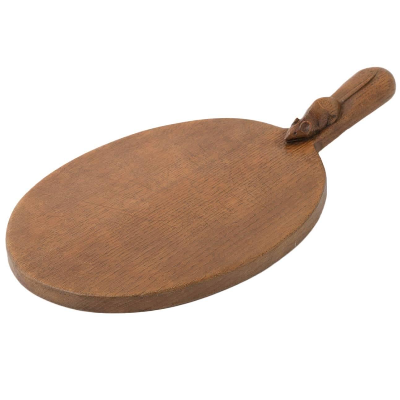 Robert Mouseman Thompson carved oak cheese Board, England circa 1970 For Sale