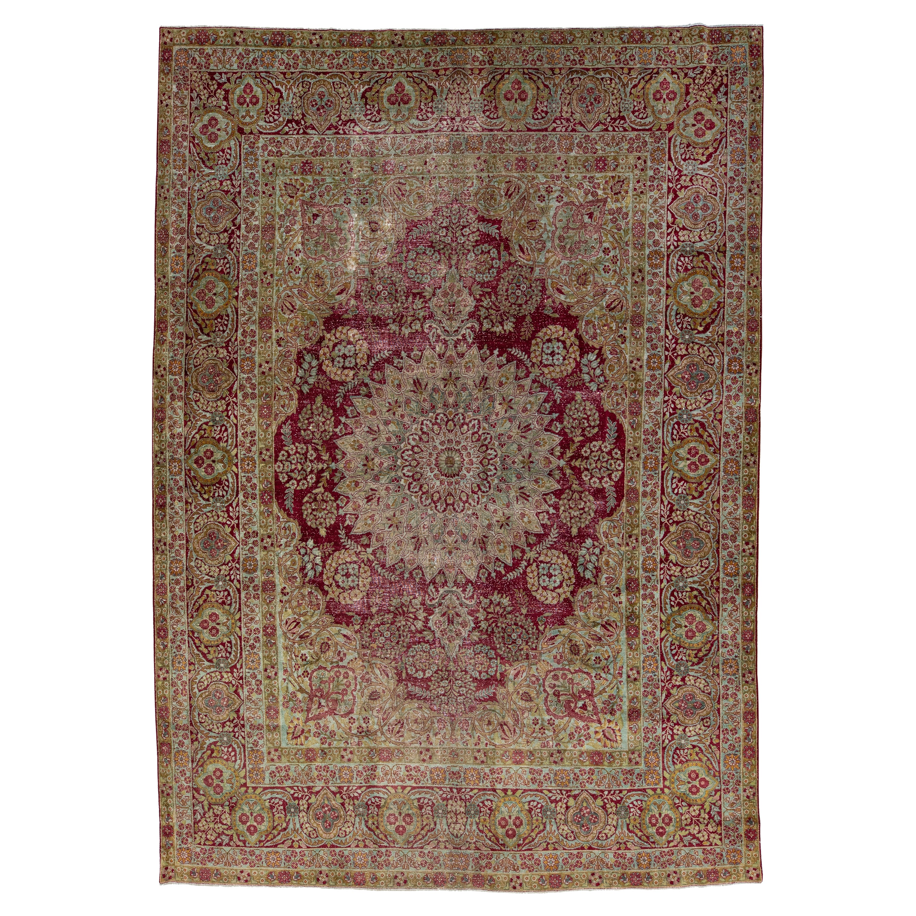 Antique Wool Rug Persian Kerman featuring a Medallion Floral Motif
