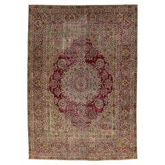 Antique Wool Rug Persian Kerman featuring a Medallion Floral Motif