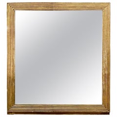 Miroir transitionnel français en bois doré