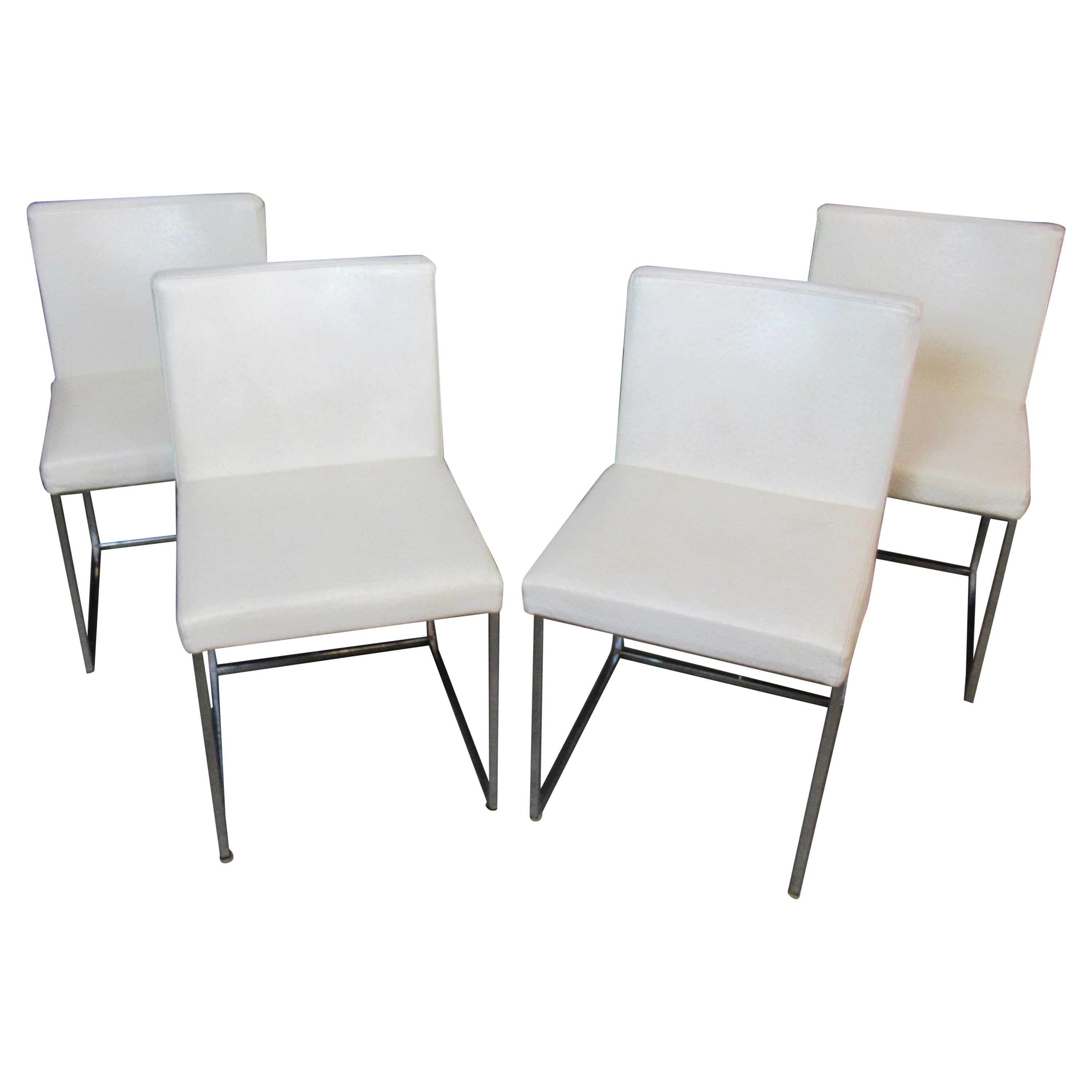 Four Ostrich Leather Dining Chairs by Calligaris
