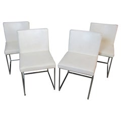 Quatre chaises de salle à manger en cuir d'autruche par Calligaris