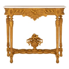 Consola de madera dorada y mármol de carrara blanco de San Luis XVI del siglo XIX francés