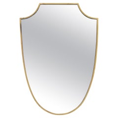 Large Mid Century Modern Shield-shaped Mirror in Brass frame, Italy 1950s