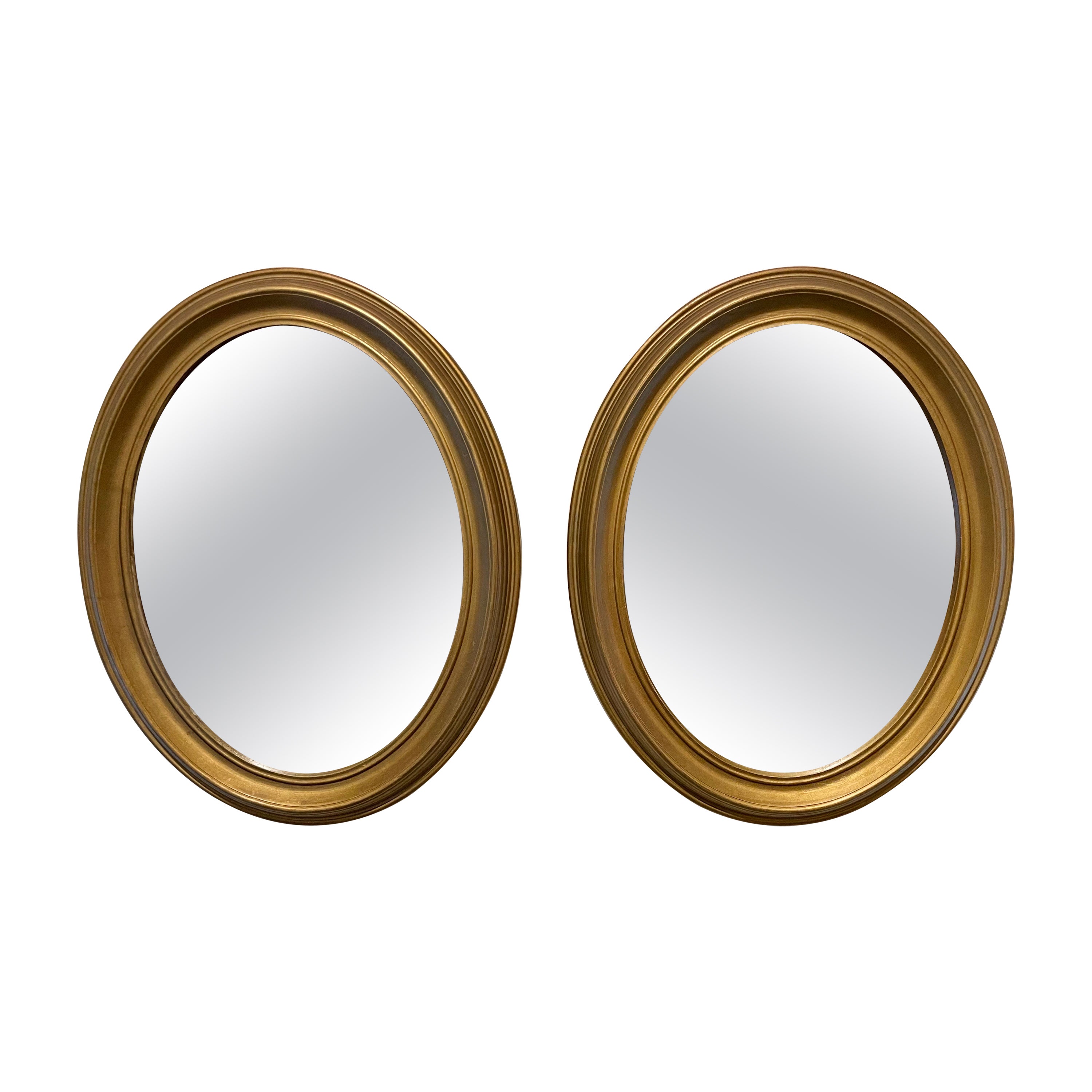 Pair of Vintage Gilt Oval Italian Mirrors For Sale
