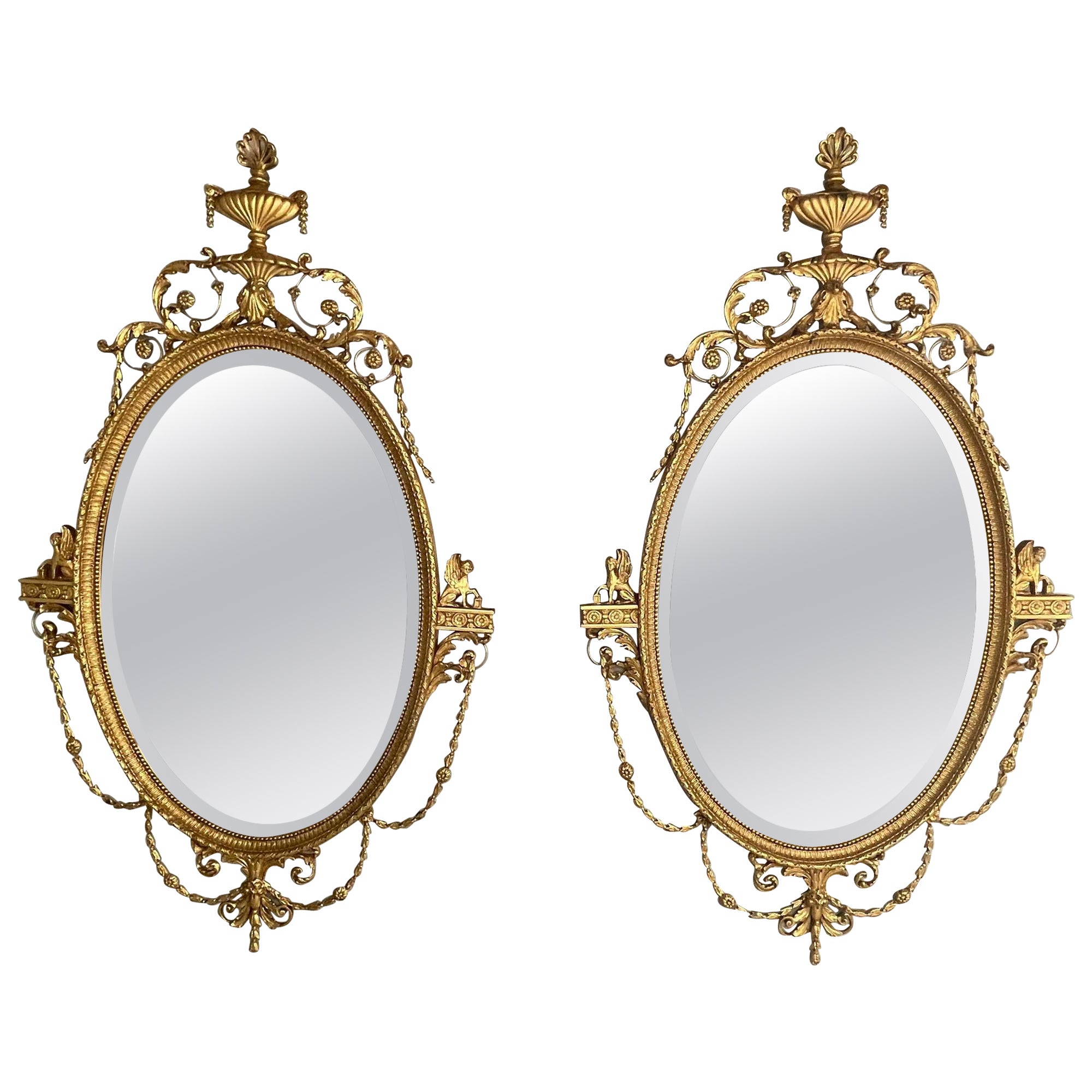 Miroirs muraux ovales de style Régence anglaise Friedman Brothers, bois doré et gesso