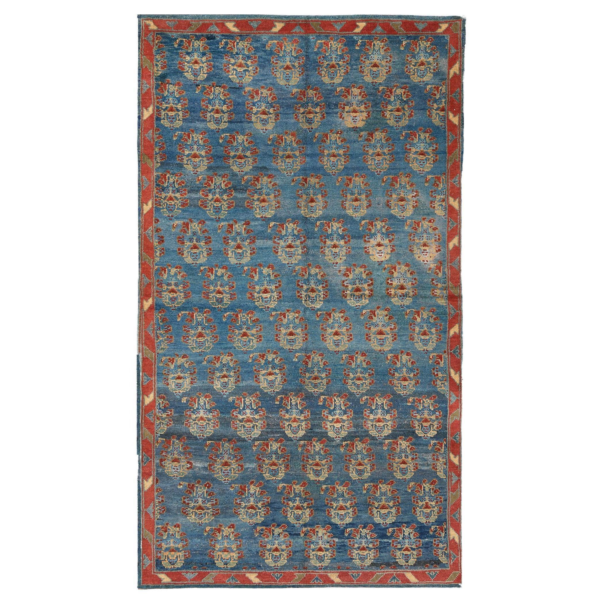 Hand-woven Antique Circa-1900 Blue Boteh Turkish Oushak Rug For Sale
