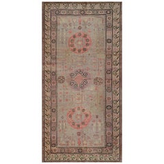 Handgewebter Khotan-Teppich aus antiker Wolle