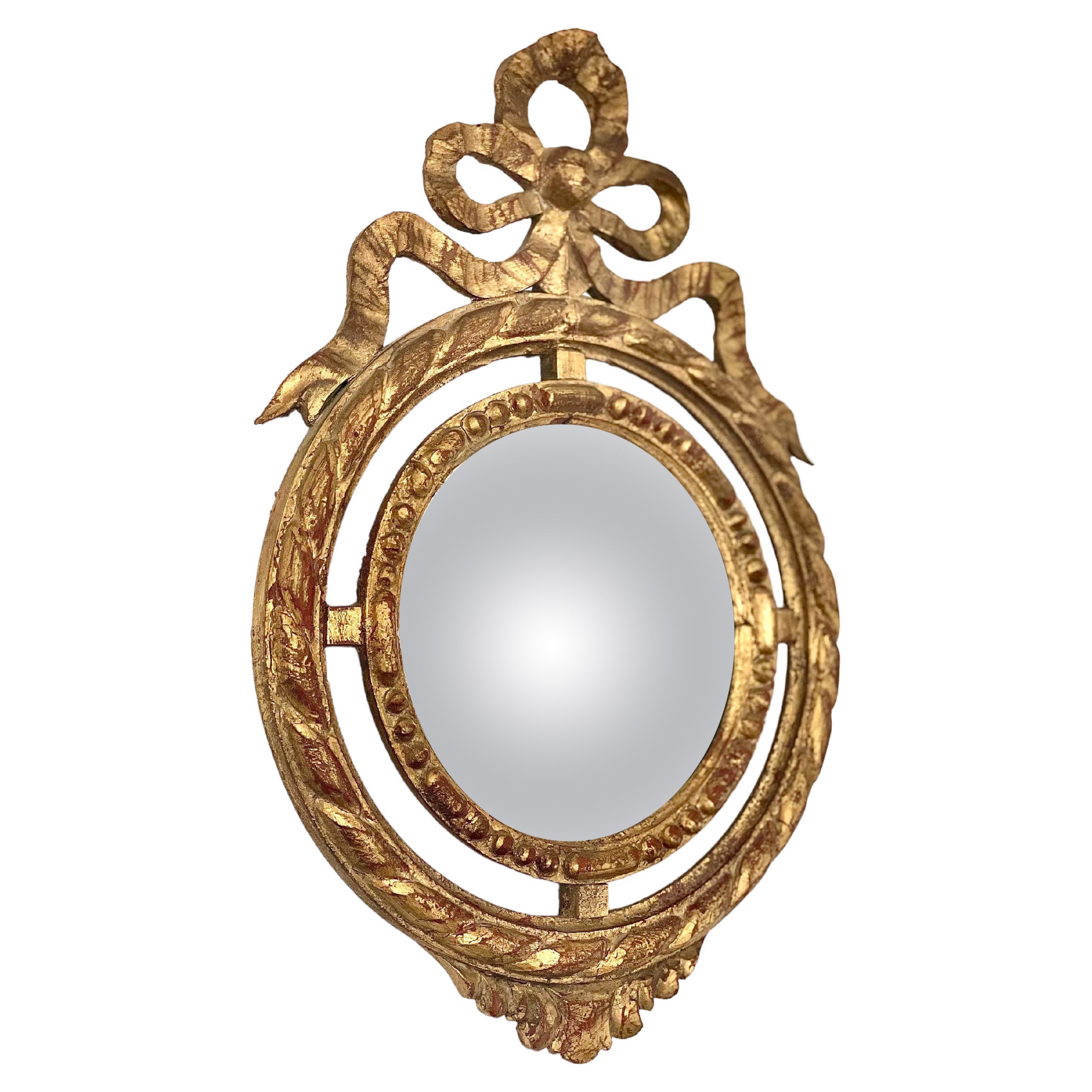 Miroir convexe en bois doré Louis XVI 1900 en vente