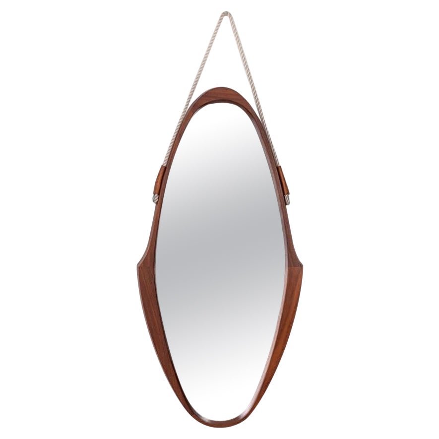 Vintage 1960s oval wall mirror in wood Italian design For Sale