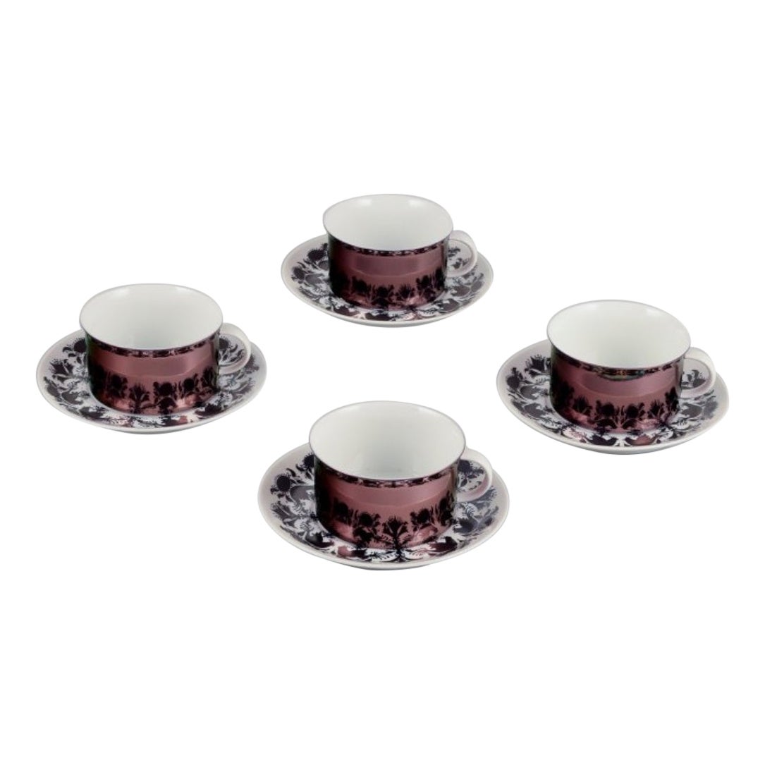 Bjørn Wiinblad for Rosenthal. Four "Berlin Hilton" coffee cups with saucers For Sale