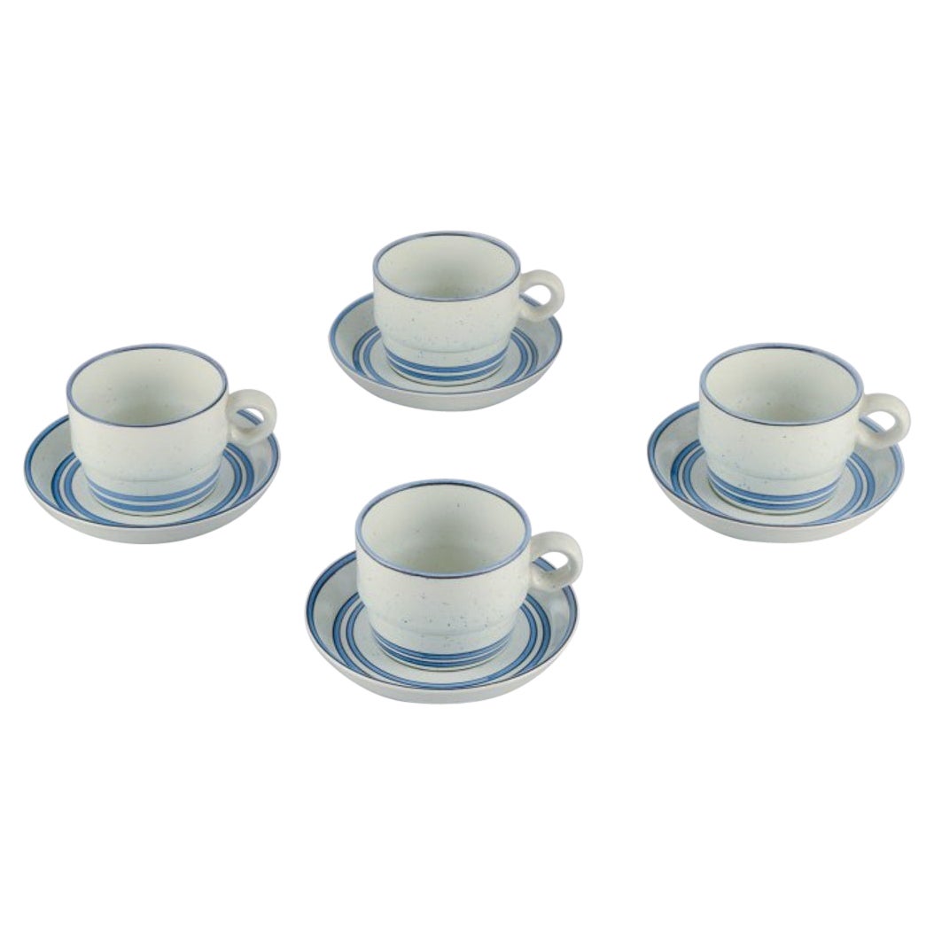 Stig Lindberg, Gustavsberg. Set of four "Dart" stoneware coffee cups and saucers For Sale