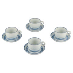Vintage Stig Lindberg, Gustavsberg. Set of four "Dart" stoneware coffee cups and saucers