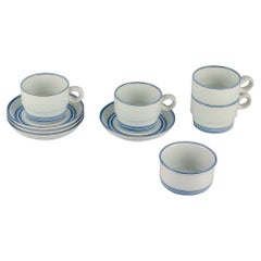 Retro Stig Lindberg, Gustavsberg. Four "Dart" coffee cups and saucers and sugar bowl