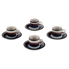 Vintage Anja Jaatinen-Winquist for Arabia. Set of four "Kaira" coffee cups with saucers
