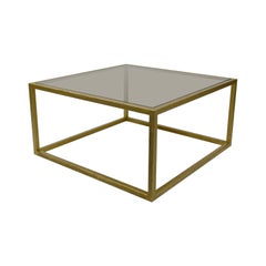Modernist coffee table in gilded metal and smoked glass, France, Circa 1970
