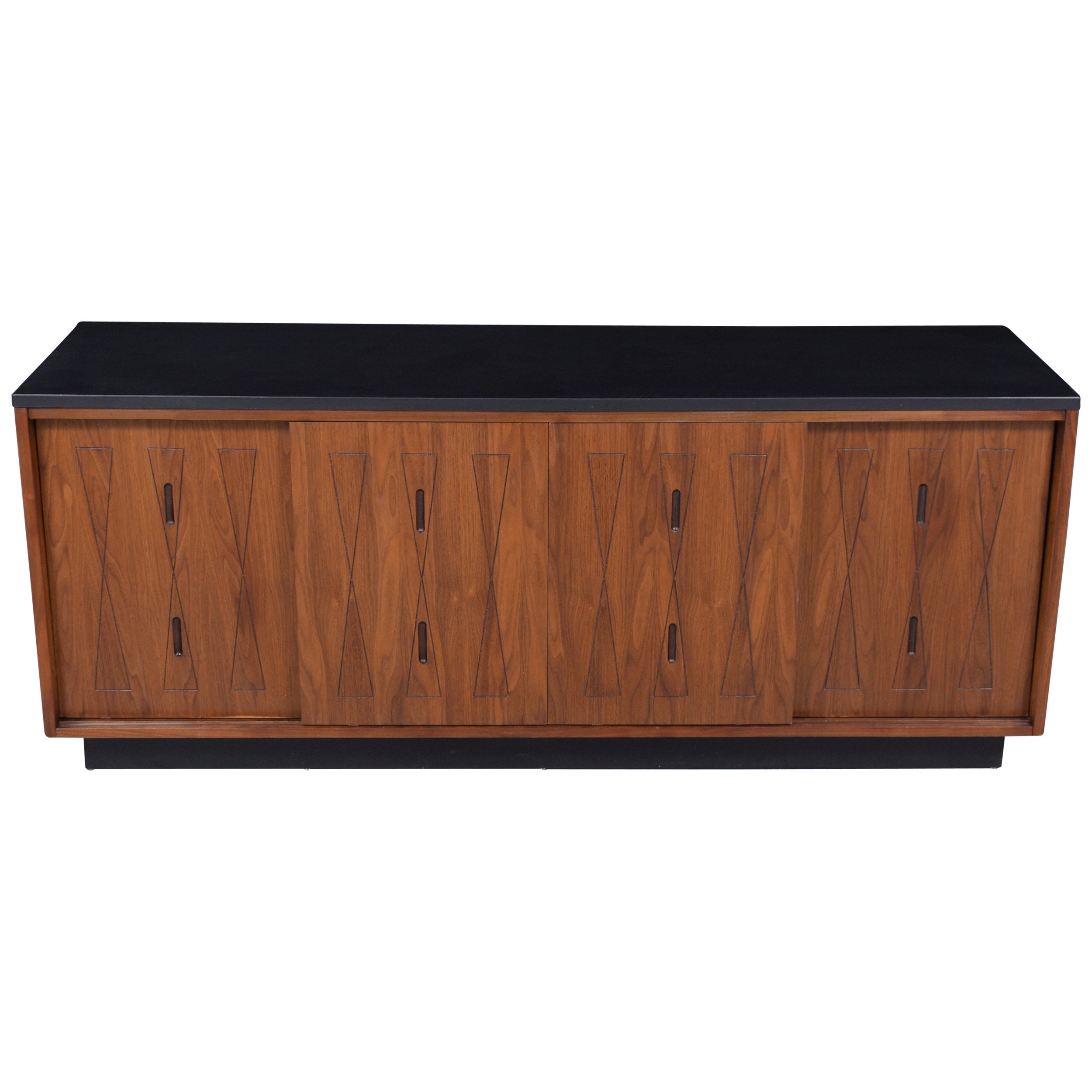 Rediscover the timeless elegance of the 1960s with our exquisitely restored vintage credenza, a showcase of the exceptional craftsmanship characteristic of the mid-century era. Our skilled craftsmen have meticulously refinished this piece to the