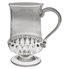 Boccale in argento con moneta da scellino del 1825 circa