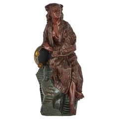 Escultura de bronce patinado bicolor de G. Leroux que representa a Aida