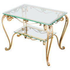 Pier Luigi COLLI design low coffee table made of gilded metal and glass. Italy, 1950s
