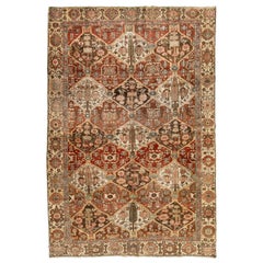 Persian Bakhtiari Rust Wool Rug with Allover Floral Pattern From The 1910s