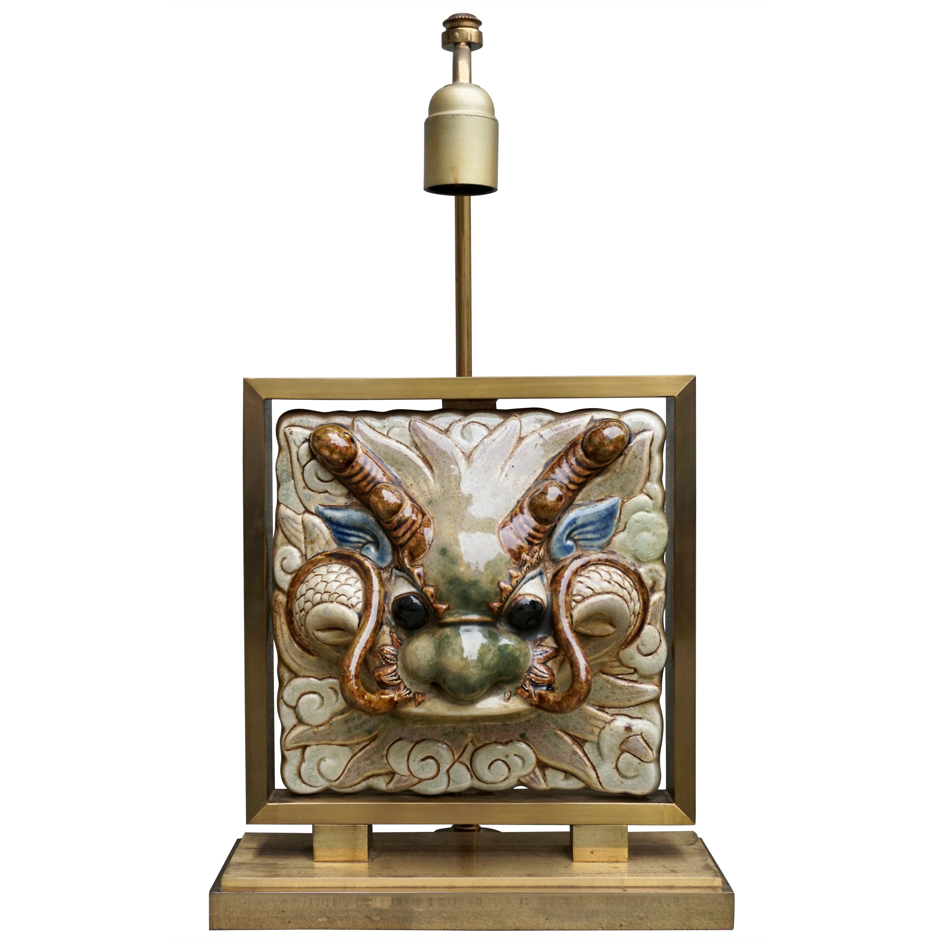 Rare Brass and Ceramic Dragon Face Table Lamp For Sale
