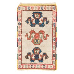 25x38 in Halb antikem Teppich mit farbenfroher Bordüre. Sitzbezug oder Türmatte. Alle Wolle