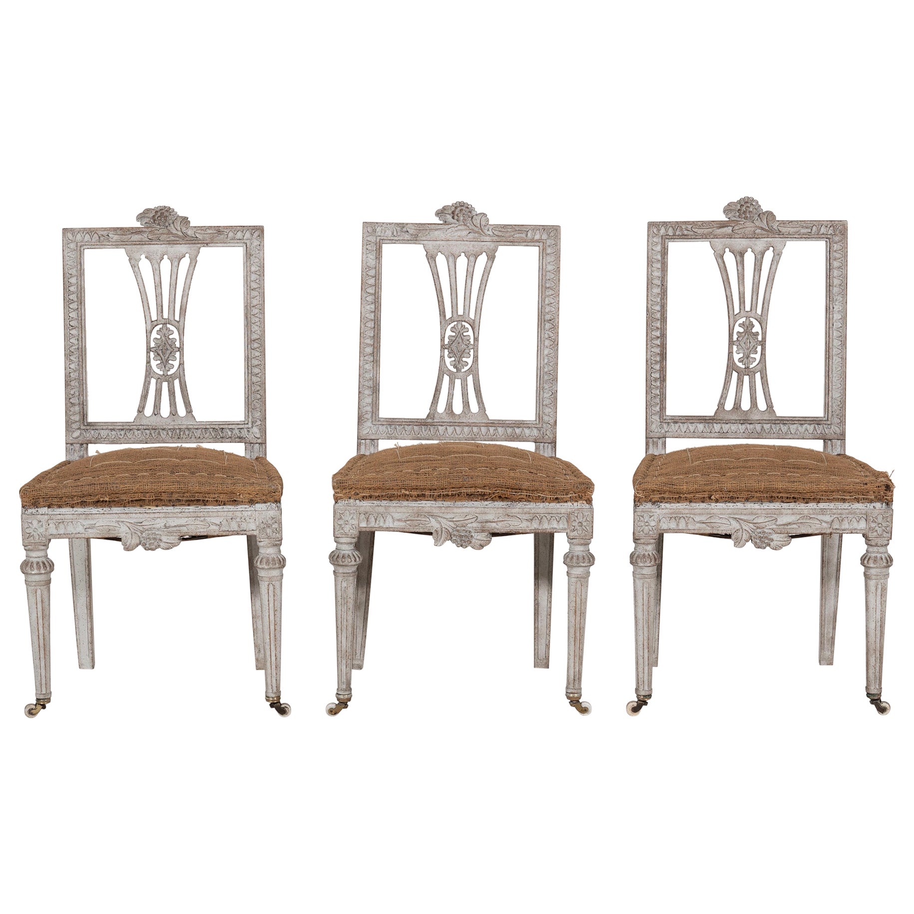 Three richly carved Gustavian side chairs, 18th C. For Sale