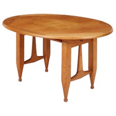 Used Blond oak center table or dining table by Guillerme & Chambron for Votre Maison