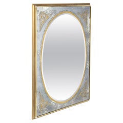 Miroir moderniste du milieu du siècle dernier en églomisé doré avec bordure fumée vieillie