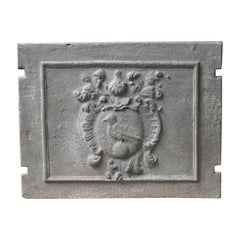 Plaque de cheminée / dosseret "armoiries" Louis XIV du 17e au 18e siècle