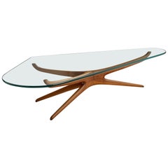 Vladimir Kagan, table basse "Tri-Symmetric", noyer, verre, États-Unis, années 1950