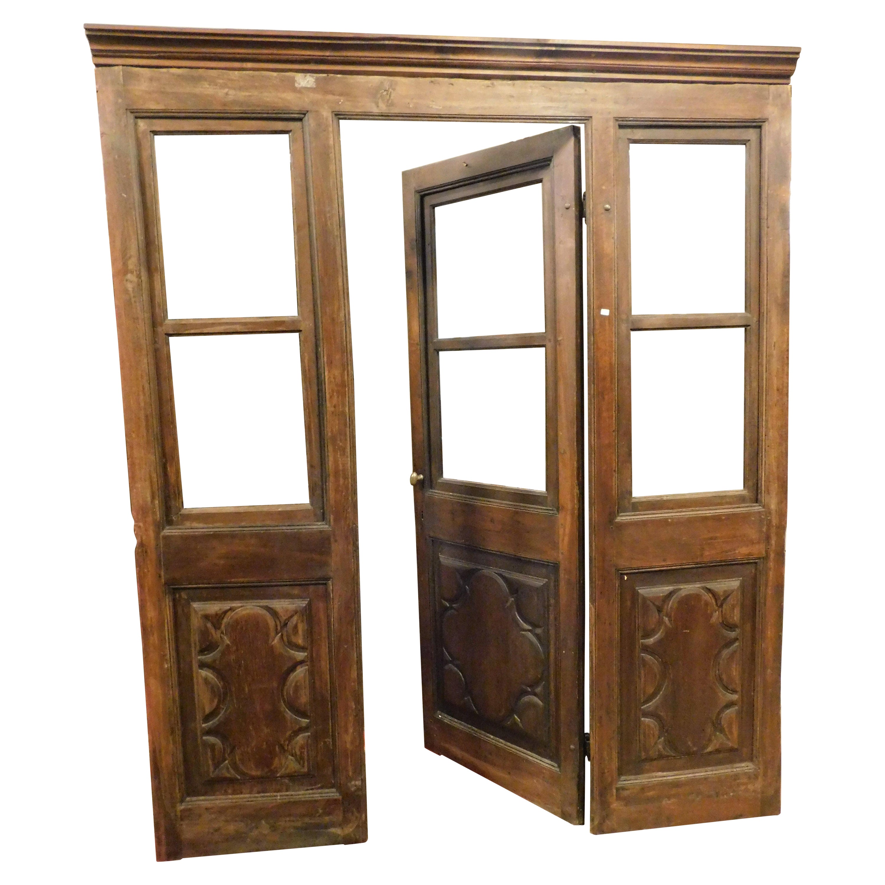 Glass entrance shop door with windows, carved walnut and complete frame, Italy For Sale