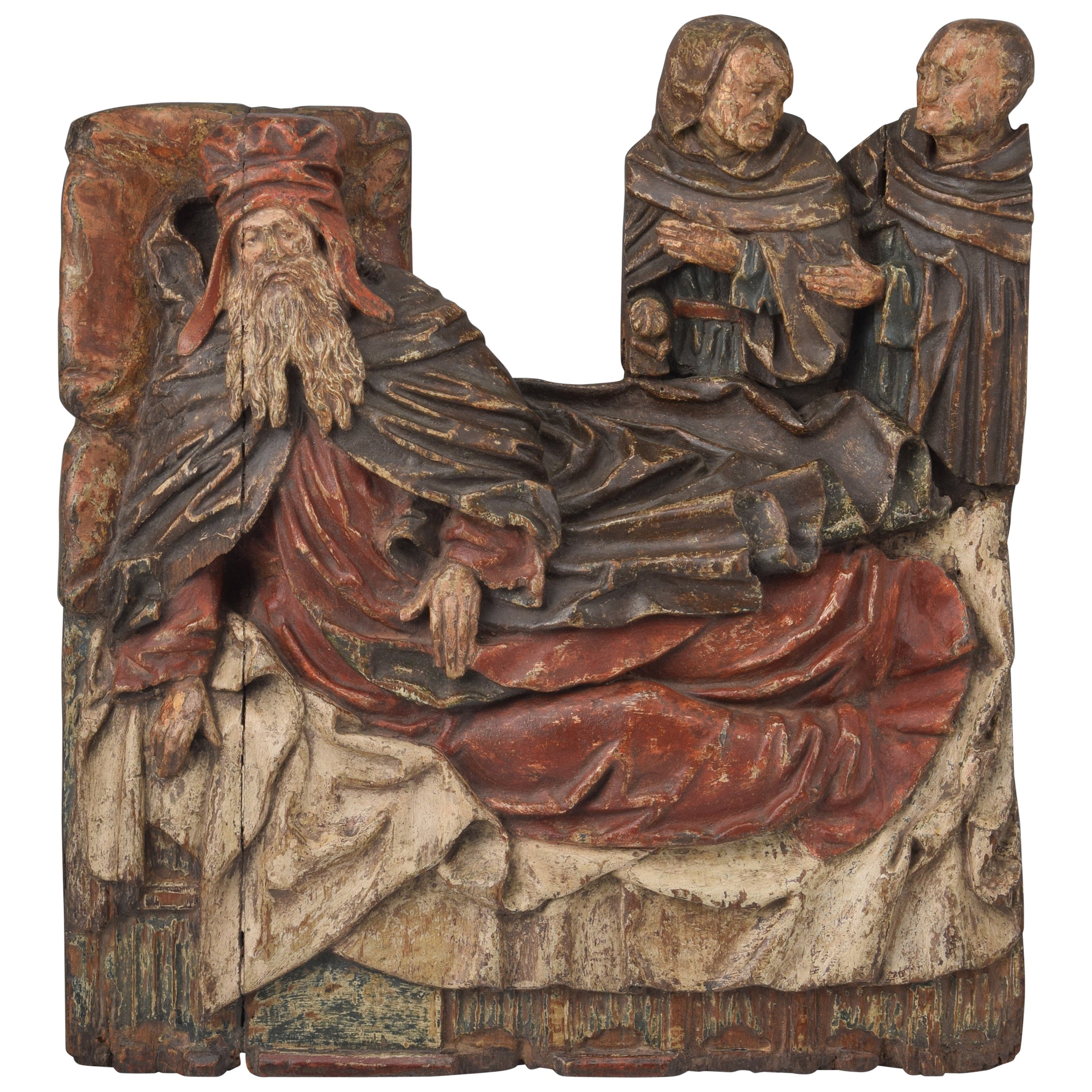 Saint on a bed. Polychromed wood. Flemish school, 16th century. For Sale