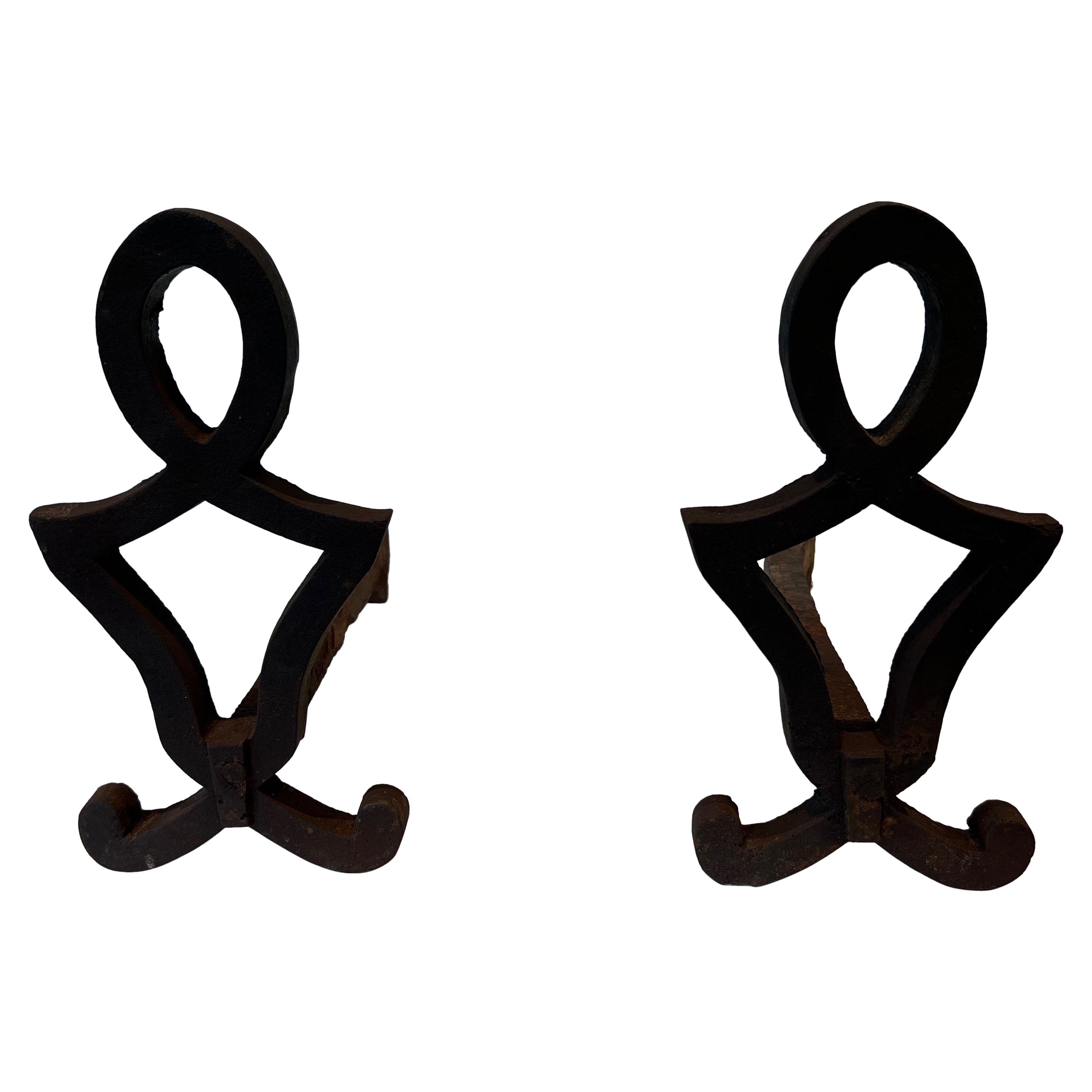 Pair of Modernist Cast Iron and Wrought Iron Andirons by Raymond Subes For Sale