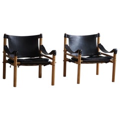 Paire de chaises longues Sirocco en frêne et cuir, Arne Norell, Ab Aneby, années 1960