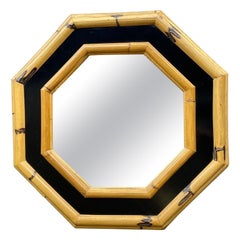 Vintage A 1970s Italian octagonal bamboo mirror with black laminated centre