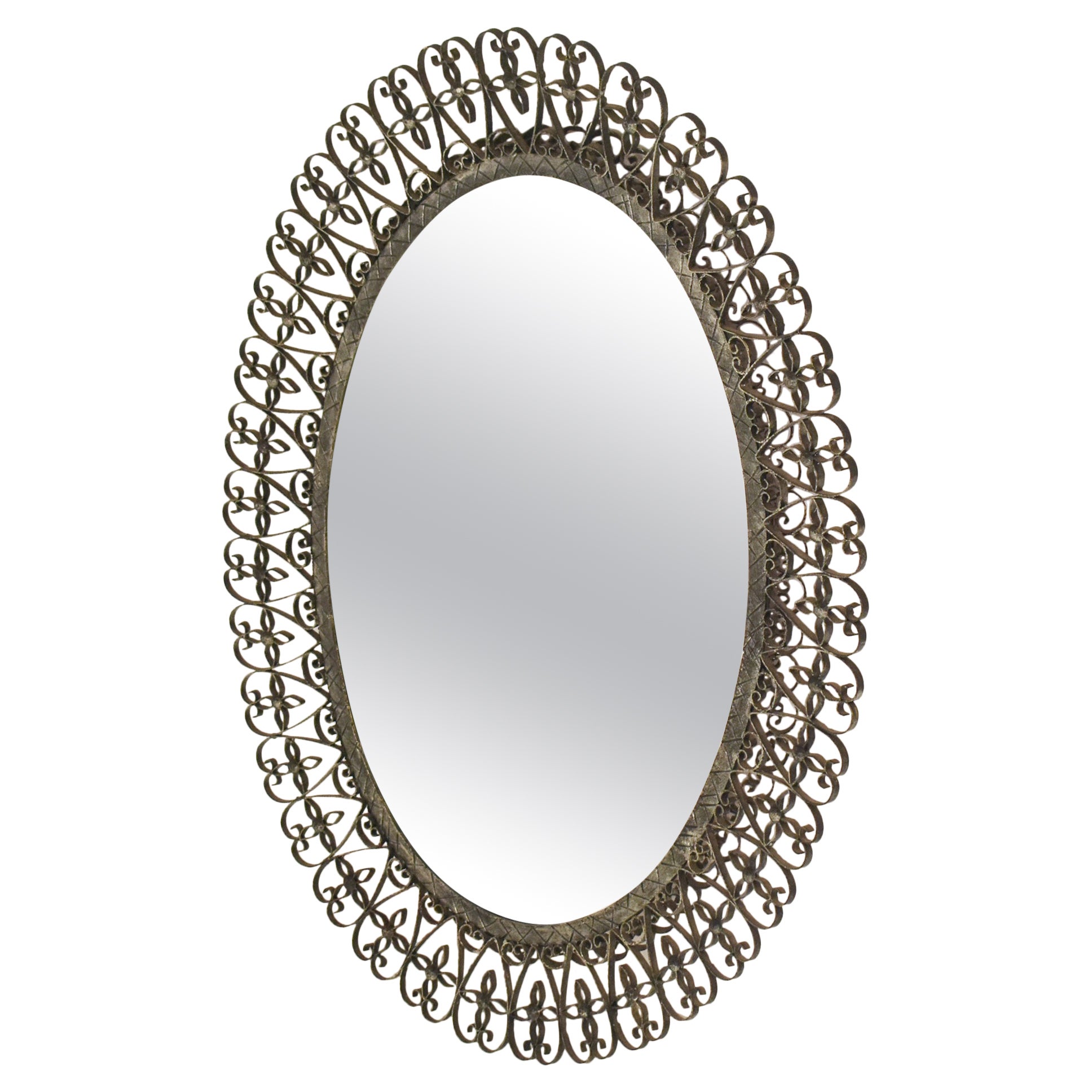 Oval mirror, wrought iron. Spain 1970's Patinated in aged silver color.