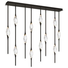 "Il Pezzo 12 Staggered Chandelier" - length 150cm/59” - black and polished brass